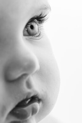 Baby Girl macro close up shot of eye during photoshoot black and white
