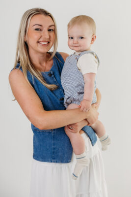 Mother holding her baby boy during a portrait.