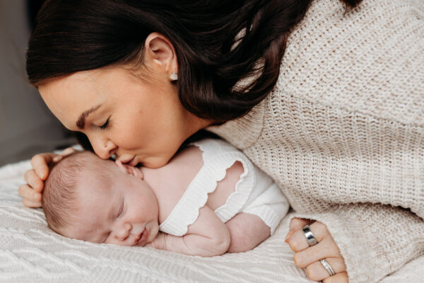 Natural family portrait capturing a special moment between parents and children.
